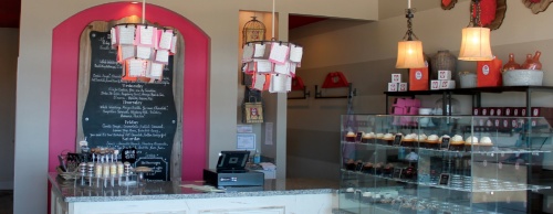 The shop is open seven days a week and serves 13 different flavors of cupcakes each day.