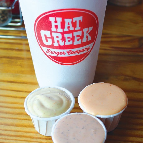 Made-in-house sauces come free with each Hat Creek Burger Co. meal order. 