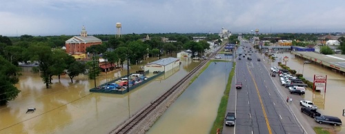 This photographu2014taken by Caleb Brown with a camera-equipped droneu2014shows the downtown Katy area of Hwy. 90 and the flooded portions of the city along Avenue D.