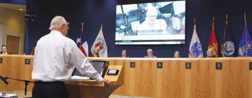 Ken Jacob, a member of the Flood Mitigation Task Force, presents the groupu2019s final report to City Council on May 19.