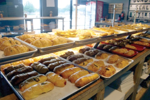The menu rotates on a daily basis with both savory and sweet fillings for kolaches and doughnuts.