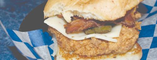 The Teacheru2019s Pet, one of 11 options on the original menu, is a hand-battered chicken-fried chicken burger ($6.99 for a single patty, $8.99 for a double patty).