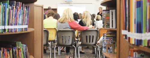 Teachers gather at Sullivan Elementary School for a meeting one week before the building opens.