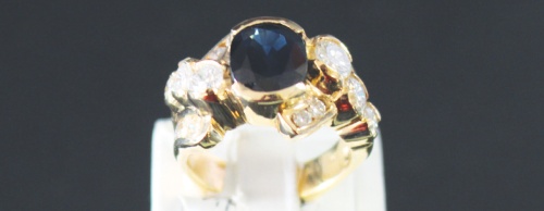 Ismael S. Albarran designs some of his own jewelry, including this sapphire ring with gold and diamonds at Quail Valley Jewelers in Missouri City.