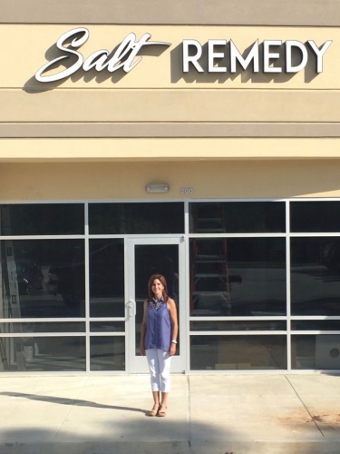 Owner Cassandra Mays stands in front of Salt Remedy, which is set to open in October.