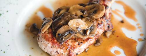 Ransomu2019s Steakhouse and Saloon offers classic Texas dishes, such as pork chops ($17.99).