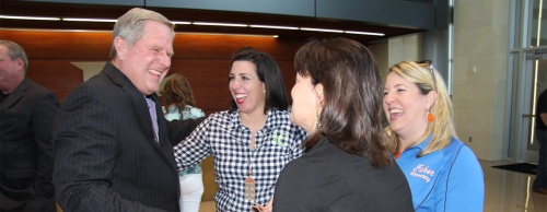 Wilkinson visits with Frisco ISD principals during the reception held in his honor.