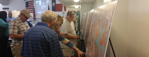 Jersey Village residents browse informational displays at a public meeting on flooding Oct. 18.