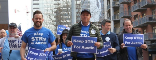 HomeAway CEO Brian Sharples leads a march to Austin City Hall on Feb. 23 in support of short-term rentals. 