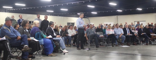 Dozens of community members gather Nov. 10 in Dripping Springs to voice their opposition to a permit that would allow the city of Dripping Springs to eventually discharge up to 995,000 gallons of wastewater per day into Onion Creek. 