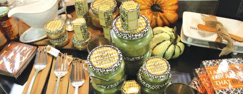 Home decor items include Tyler Candle Co. candles.