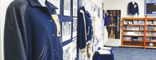 Each room at the Friendswood School Museum is dedicated to a theme. One room (above) features athletics, including donated letterman jackets and cheer uniforms.