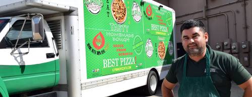 Co-owner Si Mendoza designed and built a custom food truck inside a retrofitted U-Haul truck to serve pizza and chicken wings at sporting events.