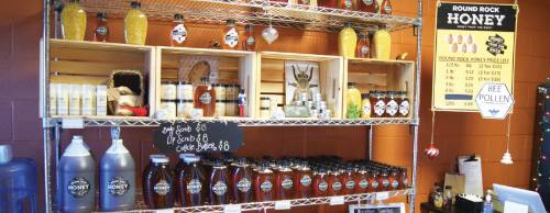 The companyu2019s honey, and other items derived from honey, are sold at a small store at the front of the business.