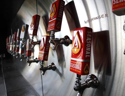 A row of beer taps inside Austin Beerworks' new taproom.