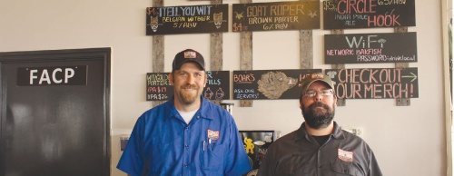 Co-owners Kris Szecsy (left) and Brian Allen opened Pearlandu2019s first craft brewery, Bakfish Brewing Co., in March.