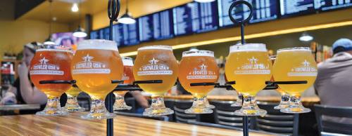 Growler USA is hosting its fourth Bottle Share event on Dec. 23.