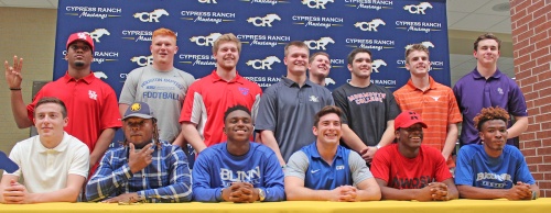 Cypress Ranch football players celebrate signing with their respective schools on National Signing Day. Pictured (front row, from left) are: Dominick White, EJ Thompson, Austin Goffney, Carter Kidd, Deondrick Montgomery and Keric Wheatfall; and (back row) Amaud Willis-Dalton, Samir Martula, Harrison Loveless, Lawson Pyles, Chase Cornman, Joey Shanklin, Blake Nevins and John Wilkowski. 