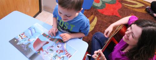 Mary Altom (right) sings for a client.