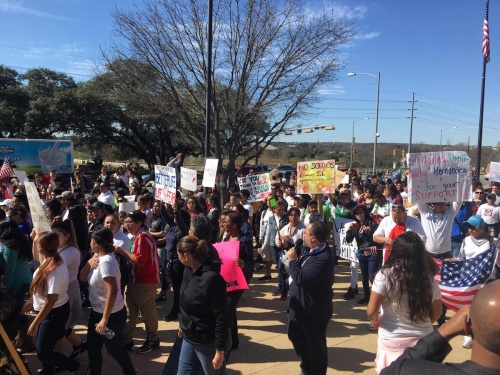 Protesters march to the state capitol during the Day Without Immigrants protest.