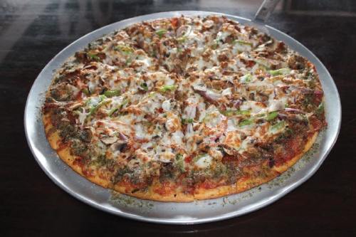 Free throw pizza n($15 to $17): Pizza is topped with pepperoni, sausage, onions, mushrooms and green peppers.