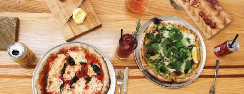 Pizzeria Sorellina features a classic margherita pizza and a signature roasted fennel pizza, a salumi plate and a Gin Rosso.