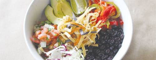 Grain bowls, made with rice, beans and fresh vegetables, are a newer menu item at Skeeteru2019s