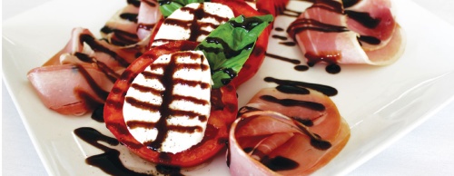 Prosciutto and buffalo ($12) is made with prosciutto, buffalo mozzarella cheese, tomatoes, extra virgin olive oil, cracked black pepper and balsamic vinaigrette.