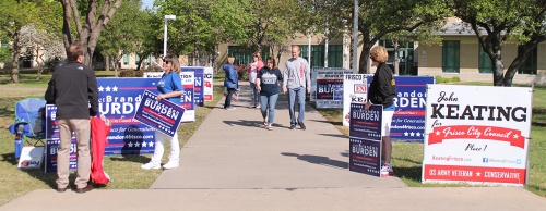 People gather to campaign and vote during the special runoff election for Frisco City Council on March 25.