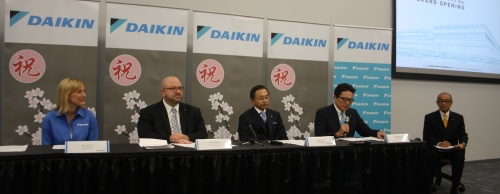 From left: Officials Kari Durham, Nathan Walker, Takeshi Ebisu and Takayuki Inoue take part in a panel session during the May 24 grand opening of the Daikin Texas Technology Park.