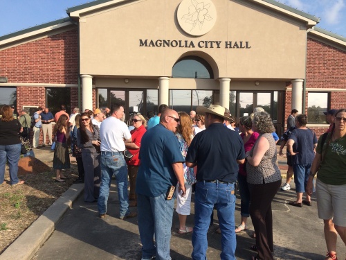 Magnolia-area residents gathered outside Magnolia City Hall after a town hall event regarding Middlelands was cancelled.