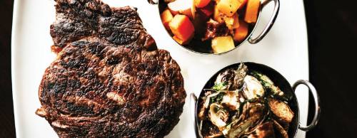 20-ounce bone-in rib-eye steak ($52): This entree features a choice of two sides and pairs well with Blade & Bow Kentucky Straight Bourbon.