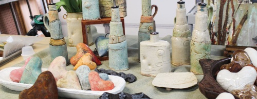 Doni Langlois creates clay heart rattles, olive oil bottles and other commissioned work in her home studio. 