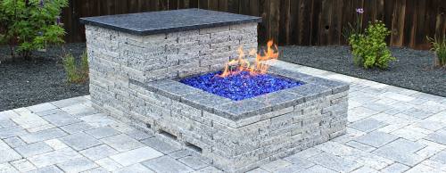 Owner of Granite Recyclers Austin Nolan Kilby uses scrap granite from countertop fabricators to create firepits, pavers and split stone veneers.