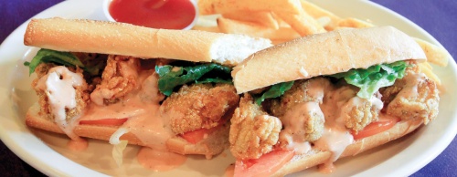 Oyster po'boy with french fries ($10.95) Fried oysters are served on toasted French bread with lettuce, tomato, pickles and mayonnaise.