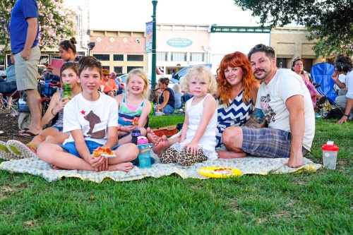 Families enjoy the Music on the Square summer concert series in Georgetown. 