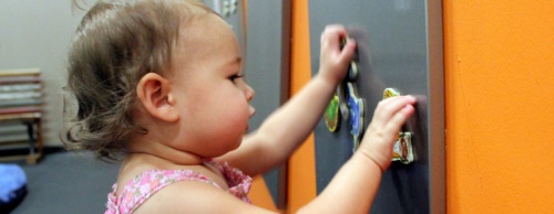 Playing with magnets helps develop fine motor skills.