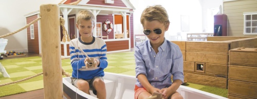 Play Street offers a number of interactive exhibits, including a food market and fishing boat.