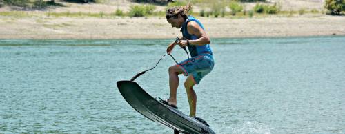 JetSurf Academy ATX owner Kyle Ray demonstrates a jump with a JetSurf boardu2014a gas-powered personal watercraft that gives riders an experience similar to surfingu2014on Lake Travis.
