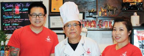 Quanwei Han (center) opened China Han in Friendswood with his son, Mike, and daughter-in-law, Cynthia, at the former Habi Dynasty.