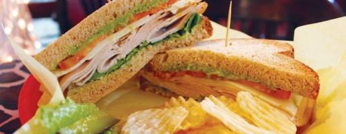 Turkey Avocado Sandwich ($8.99) The sandwich layers turkey, avocado, provolone cheese, lettuce, tomato and pesto on wheat bread.