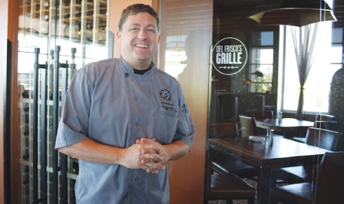 Chef Aaron Henschen poses at the Del Friscou2019s Grille in Southlake.