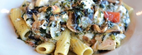 Vickyu2019s Special ($15.99)nChicken, mushrooms, spinach, fresh garlic, tomatoes and cheese with rigatoni pasta