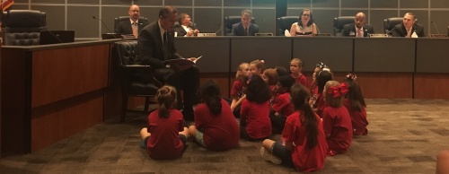 CISD Superintendent Don Stockton reads to second graders during September's board meeting. 