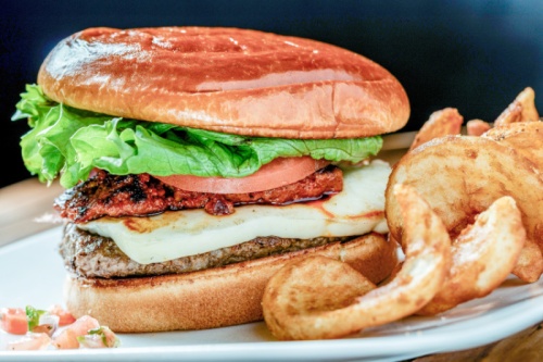 u201c095u201d Burger ($10.99): A 6-ounce burger features chorizo, pico, queso blanco, sriracha ranch, lettuce and tomato.