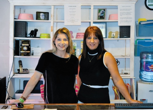 Rae Marino (left) and Lisa Chalmers (right) run the front desk at Pawty Palace.