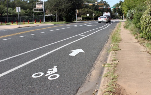Jones Road improvements include on-street protected bicycle lanes, pedestrian refuge islands, ramps, and a shared-use path for pedestrians and bicyclists to Sunset Valley Elementary School.