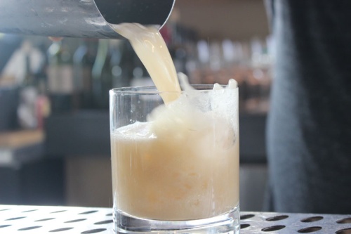 The Lambic Peach Sour is one of Boiler Nine Bar + Grill's cocktail offerings.