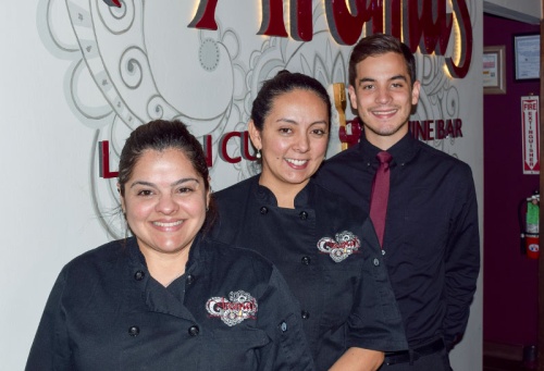 Sole Lynds (center) had owned Aromas Latin Cuisine and Wine Bar in Katy since 2016.