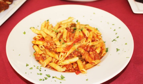 Penne Allu2019 Amatriciana ($12) Penne is served in a spicy tomato sauce with pancetta, onions and bell peppers.
